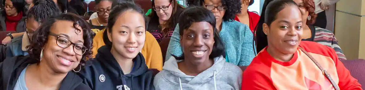 Preschool teachers together at professional development session